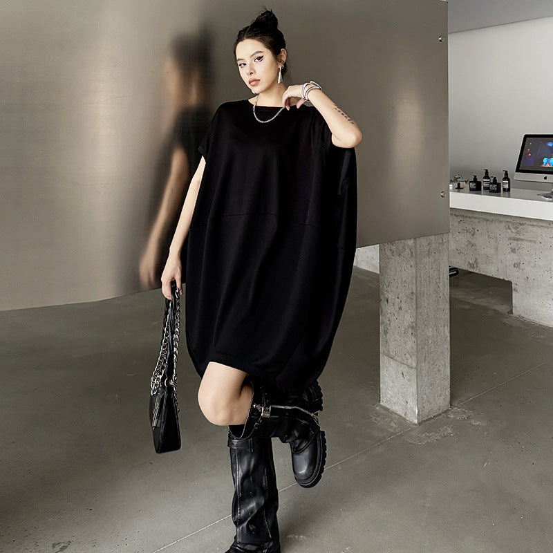 Retro Hong Kong style bat shaped loose sleeveless solid color dress for women's summer new casual slimming and personalized mid length skirt